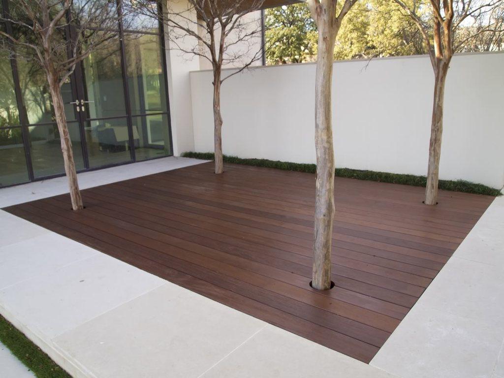 An ipe deck with trees embedded.